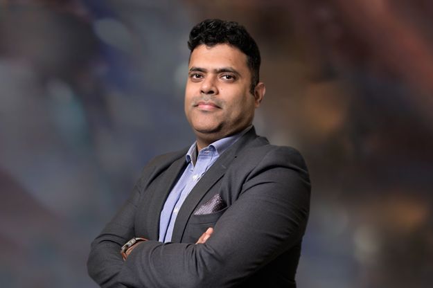 Rohan Kumar's headshot